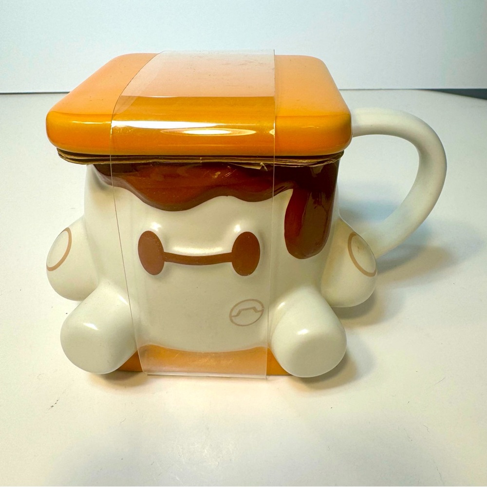 NWT. Disney Mug Baymax Smores Munchlings Ceramic 16oz Coffee Mug With Lid.
